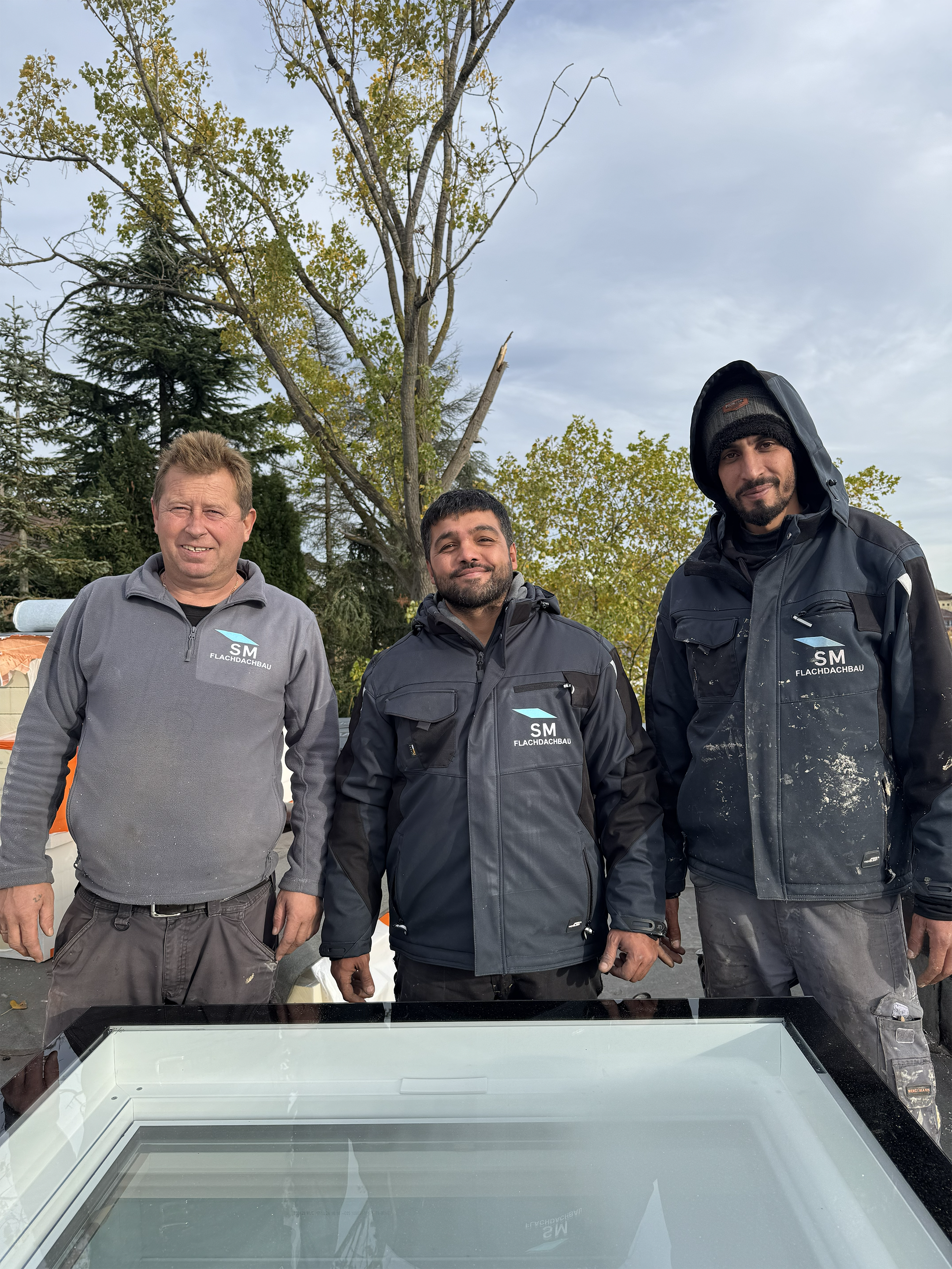 Dachdecker bei der Arbeit